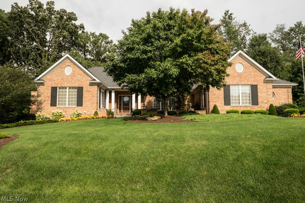 Timeless all brick beauty on a dead end street in Jackson Township/schools. This Ranch style home with finished walk-out lower level offers gracious one floor living, wide doors, custom Mullet cabinets, Soaring ceilings and more than spacious rooms. Custom built by Collier Construction, quality and finishes are impeccable. Located on a private lot close to shopping and restaurants.