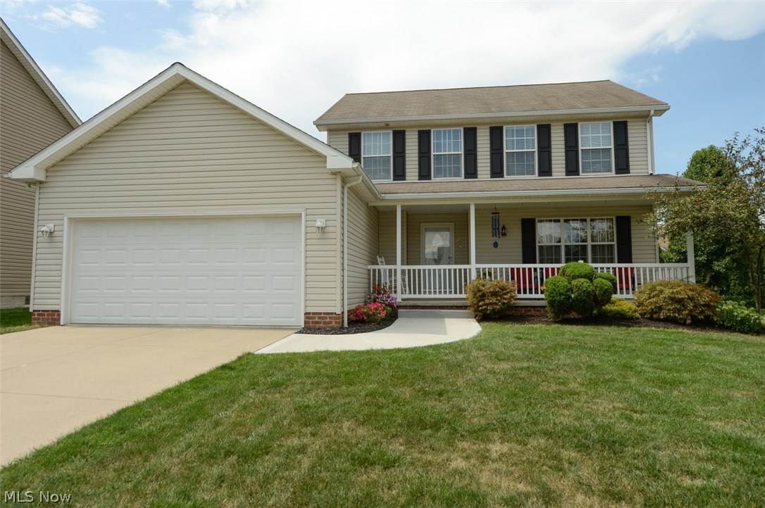 Don't miss this one!  Former Builders Model Home located on a private cul-de-sac setting.  Beautiful 3/4 bedroom home loaded with custom features.  Hickory flooring in Living and Dining room areas.    Spacious and open  Kitchen with Shaker style cabinets and newer appliances leading into the Family Room with gas Fireplace and custom tile flooring.   Large Master Suite with double closets, glamour bath with garden tub, cultured marble double sink and gorgeous cherry hardwood flooring.  Upgraded interior lighting  & 1st floor laundry with loads of storage.  The lower level features a roomy rec room (or 4th bedroom ) with bathroom.....perfect for entertaining or use as a guest suite.  Outdoors, relax on the multi-level deck overlooking a landscaped, fenced yard with raised beds and Fuji Apple and Cherry trees.   Covered front porch and newer concrete sidewalk,  With all this home has to offer,  this a home you will want to come home to!!  Call today for your private viewing.