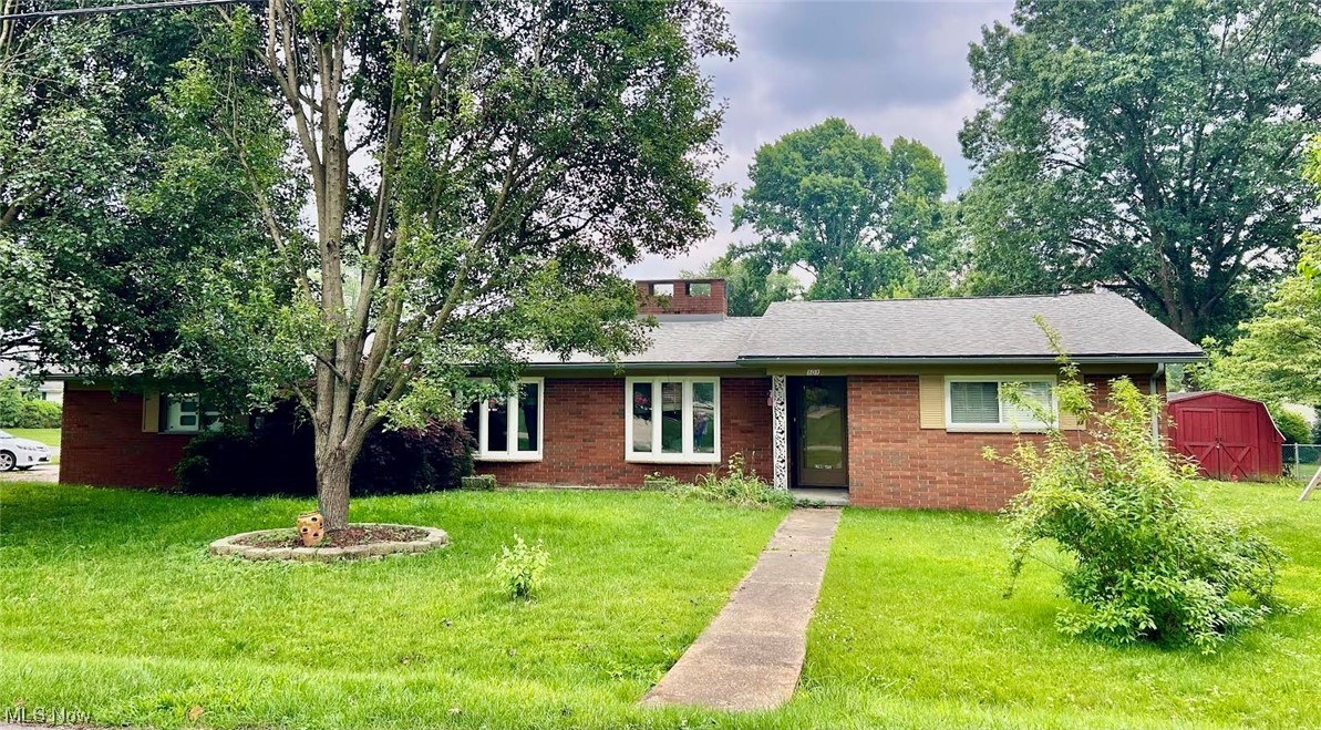 Nice brick ranch in Devola!  This three bedroom, 2.5 bath home offers easy living with first floor laundry, screened rear porch, stone fireplace with gas logs, large sunken living room and attached two car garage on a corner lot.  The part finished basement has a family room with a wood burning fireplace.  The furnace and air conditioning unit were replaced in 2021 and a new dishwasher installed in 2020.  Newer roof and windows. 10 X 12 Shed for storage. Radon mitigation system is in place. Public sewer.  Make your appointment to view right away!