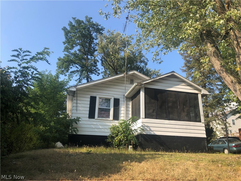 Looking for a winter project?  This is it!  Wonderful lake neighborhood property on a double lot is looking for someone to take care of it.  Lake access too!  There is a lot of potential here.  You can make it your own.  Being sold as is.
