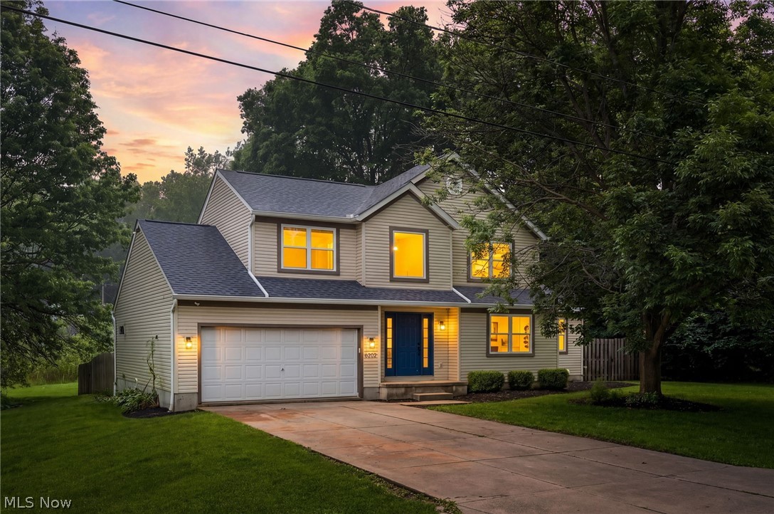 Tucked among mature trees on a beautiful lot in Kent, this thoughtfully updated home is completely move-in ready and full of style. Stunning flooring flows throughout the home, complemented by fresh paint, updated fixtures, and carefully selected finishes that create a clean, modern feel in every room. Natural light pours in through every window, each offering peaceful views of the surrounding landscape and bringing the outdoors in. Step outside to enjoy the fully fenced backyard featuring a deck with pergola — the perfect place to relax, entertain, or simply take in the beautiful setting. The full basement and spacious garage offers a blank canvas for future living space, a home gym, workshop, or additional storage. Beautifully updated inside and out, this home combines comfort, style, and a desirable location in Kent close to local amenities, shopping, dining, schools and parks.