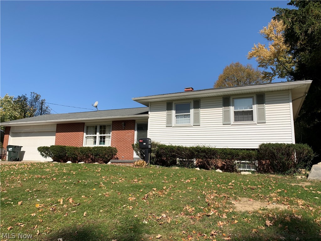 Three Bedroom 1.5 Bathroom Split Level on two parcels.  This home has a large first floor living room and a spacious family room in the basement.  The dining room has a sliding door to the back yard.  The laundry room is in the lower level with plenty of storage space.  There is a convenient two car attached garage with a man door leading to the back yard.  Seller is selling the home "As Is".  Homes like this don't stay on the market long.  Call today for your private showing.