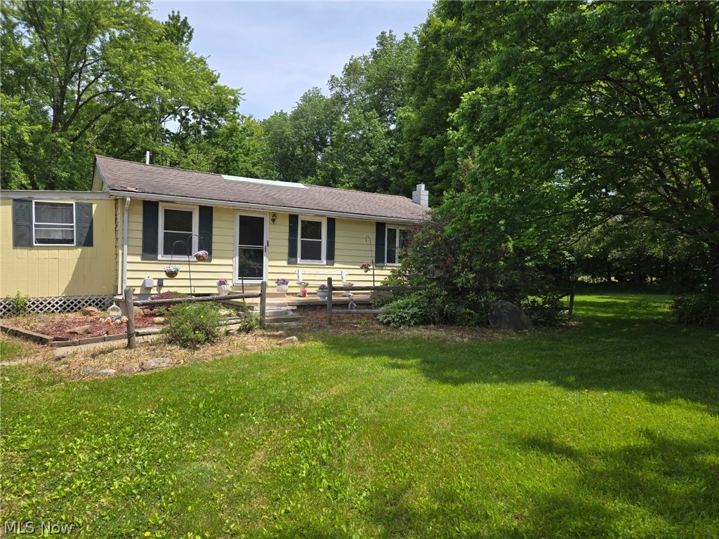 Almost Heaven is the perfect way to describe this peaceful 2.83-acre wooded property located just north of Wooster on scenic Fox Lake Road. Offering privacy, tranquility, and a beautiful natural setting, this property provides an excellent opportunity for those seeking a country retreat with room to make it their own.

The property features a 2-bedroom home with solid potential and an opportunity for updates to suit your personal style. The roof is in need of replacement, and the seller is currently obtaining bids for the project.

A standout feature is the 24' x 40' garage/shop, offering endless possibilities for hobbyists, entrepreneurs, storage, workshop space, or the ultimate man cave. A storage shed located toward the rear of the property includes a water hydrant for added convenience.

Whether you're looking for a peaceful place to call home, a property with workshop space, or a secluded setting just minutes from Wooster, this unique offering deserves your attention.

Note: Seller will need to secure suitable housing prior to closing.