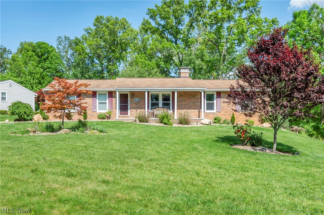 Situated on a desirable corner lot totaling nearly half an acre, this well-maintained home in North Canton offers comfort, space, and convenience in the highly sought-after Jackson Local School District! Featuring 3 bedrooms and 2 full baths, the main floor welcomes you into a spacious living room that flows into the large eat-in kitchen complete with plenty of cabinet space, an island, included stainless steel appliances, and sliding doors leading to the deck — perfect for indoor and outdoor entertaining. All three bedrooms are generously sized, including a primary bedroom with its own full bathroom.
The partially finished basement provides additional living space with a cozy rec room featuring a fireplace, plus a large bonus room perfect for a potential fourth bedroom, home office, workout room, or playroom. Laundry area is conveniently located in the basement as well. Outside, enjoy the expansive backyard, attached 2-car garage, and the added privacy and space of the oversized .48-acre corner lot. Conveniently located near shopping, schools, parks, and more!