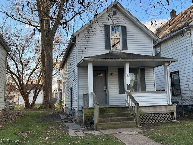 Don't miss this 3-bedroom, 1-bath colonial in the heart of Elyria. This home offers 1,418 sq ft of living space with a functional first-floor layout that includes a living room, dining room, and kitchen. All bedrooms are located on the second floor. Features include a full basement, vinyl siding, covered front porch, remodeled kitchen and bath. Great for owner occupants OR investors, this home would rent for around $1400/mo. Other features: upgraded electric panel, newer hot water tank, modern furnace, ceiling fans, vinyl plank flooring. Located near Route 57, shopping, parks, and schools, this property provides convenient access to everything Elyria has to offer.
