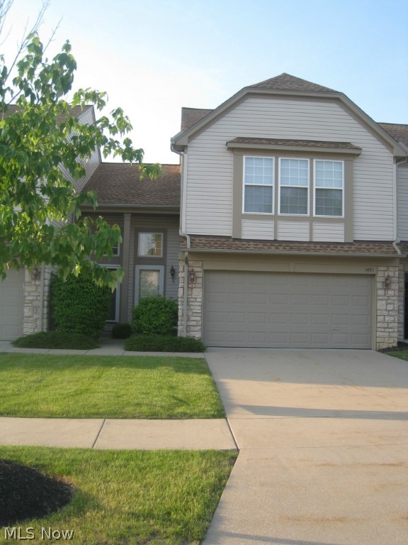 This one-owner townhouse has been smoke free and pet free! Super clean, freshly painted and ready for new owner!  New carpeting was installed 2012, and prof. cleaned in March 2014. Vaulted Great Rm includes a gas fireplace and lots of natural light from the Palladium window, w/ custom silhouette blinds. Kitchen has newer laminate flooring (2012) & includes gas range, refrigerator, dishwasher, & brand new built-in microwave.  Dining area has a slider that leads to the patio with privacy fence. The spacious Master suite features a vaulted ceiling, window treatments, ceiling fan, walk-in closet & full bath. 2nd floor also includes another bedroom, full bath, laundry room and small loft area for a desk or reading chair. Enjoy the walking trails, swimming pool, playground and common facility. Convenient to I-77, between Cleve and Akron, about 20 mins to Cleve Hopkins Airport. This property is available for immediate possession. Seller is providing a 1 yr Home Warranty & FHA buyers welcome!
