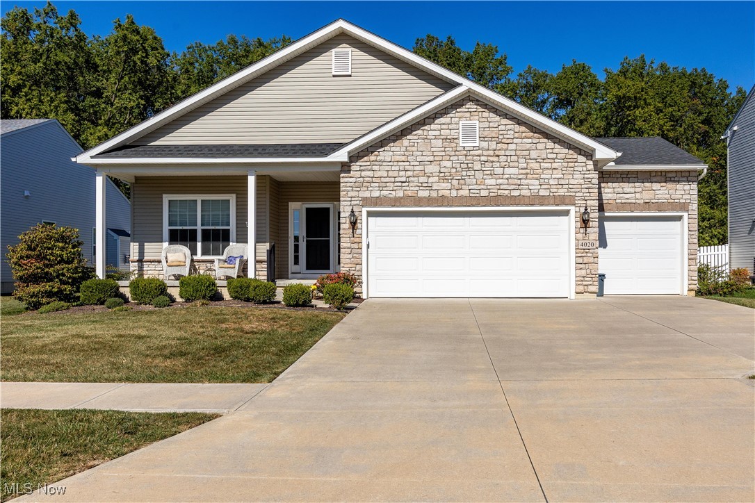 Welcome to 4020 Rossi Way in Lorain, located in the highly sought-after Amherst School District!
This stunning 5-year-old ranch offers modern living at its best with 10 years of tax abatement still remaining for you to
enjoy! Step inside and fall in love with the open floor plan that perfectly complements todays lifestyle of being together. The
gourmet kitchen is a chef's delight, featuring quartz countertops, a large island, plenty of cabinets and counter space,
and all appliances included. All open to the inviting family room with a beautiful stone fireplace. This home boasts 5 bedrooms and 3 full bathrooms, including a spacious master suite with a walk-in closet and double sink vanity. The convenient first-floor laundry room adds an extra touch of practicality to everyday living. The finished lower level offers incredible flexibility, featuring two bedrooms with egress windows, generous closet space, and a full bath making it perfect for an in-law suite, guest area, or extended living space. Enjoy outdoor living on the covered front porch or relax in your fully fenced backyard ideal for entertaining, pets, or
peaceful evenings. The 3-car attached garage provides ample space for vehicles and storage. Located in a desirable neighborhood, this home truly checks all the boxes modern style, functional layout, and unbeatable value. Don't miss your opportunity to make this move-in-ready ranch your forever home!