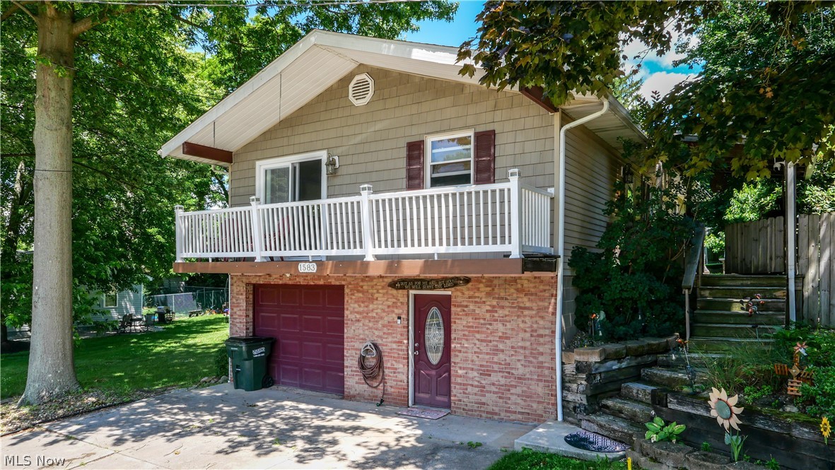 Welcome to this wonderful 4 bedroom 2 bathroom raised ranch Located on a double lot in Ackers Lake. The curb
appeal alone will make you want to "call" this home, but when you step inside, the updates will be too appealing not to
"make" it home. The Kitchen was updated in 2015 w/beautiful solid wood cabinets, granite countertops, tile back
splash, stainless steel appliances and vinyl plank flooring. The stove and microwave are both 2 years old. There is recessed lighting through out and the spacious living/family room has a sliding door that leads to a covered porch. Three of the homes 4 bedrooms are located down the hall and share an updated bathroom with marble floors and an upgraded vanity with double marble sinks. In 2017 a bedroom/playroom and a full bath were added to the walk-out lower level, giving this home additional room to roam.
The laundry room is located on this level, as is the access to the 1.5 car attached heated garage. Here you will find
additional access to the partially fenced yard that is ideal for family fun days whether playing in the snow, having a
summer picnic, or just enjoying a lazy evening around the fire. For those a bit more adventurous, the park and lake
are only a few minutes walk. Additional updates to this home include: roof in 2017, windows and siding in 2019, and a new
furnace 6 months ago. The downstairs plumbing was also replaced and upgraded 2 years ago.

 Don't miss out on this beautiful home. Call today for your private showing.
