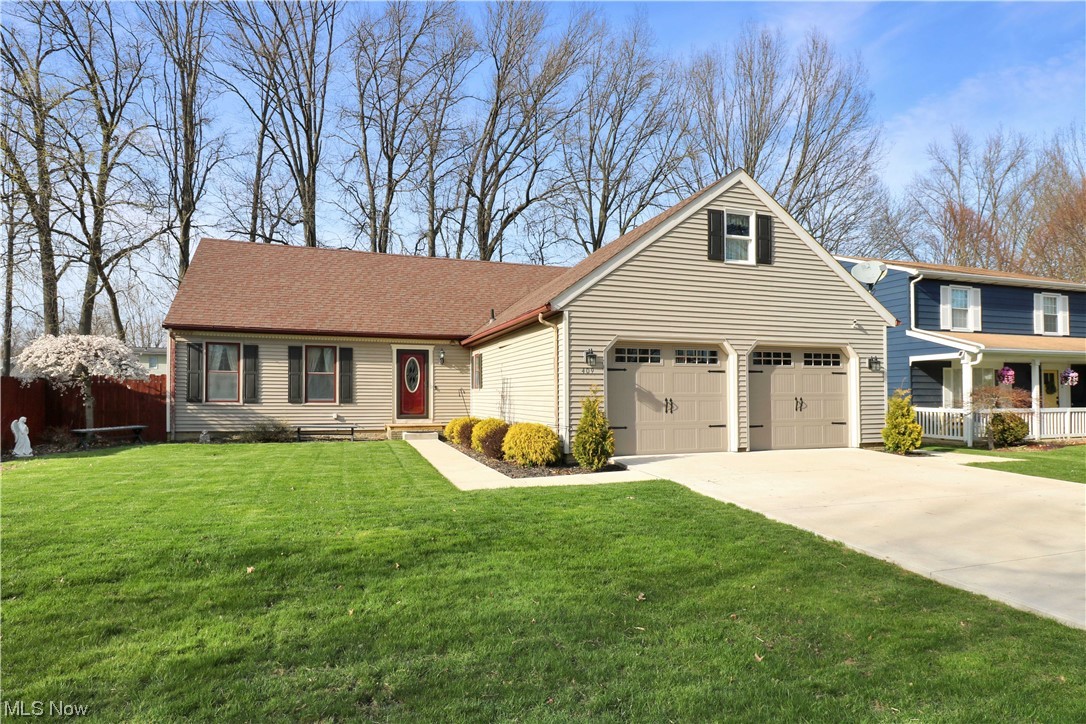 Welcome to this lovely Cape Cod with gorgeous curb appeal!  This property is on a quiet dead-end street in a fantastic Midview location. This one is move-in ready boasting four nicely sized bedrooms and two and a half baths.  The first floor has the master bedroom and a second bedroom with a brand new updated full bath featuring a gorgeous walk-in tiled shower.  Two additional newly updated bright, spacious bedrooms are upstairs with another full bath. The lower level houses a recreation room and a family room that has been split into an additional possible fifth bedroom. Enjoy the wood-burning fireplace and a workshop area with wooden benches for all of those home projects.  The fully applianced eat-in kitchen opens to the living room with a new sliding door to the back yard.  The backyard is fenced and perfect for entertaining. The handy storage shed conveys with the home. There are many updates, including new carriage-style garage doors, concrete drive, sidewalk, patio, and Anderson