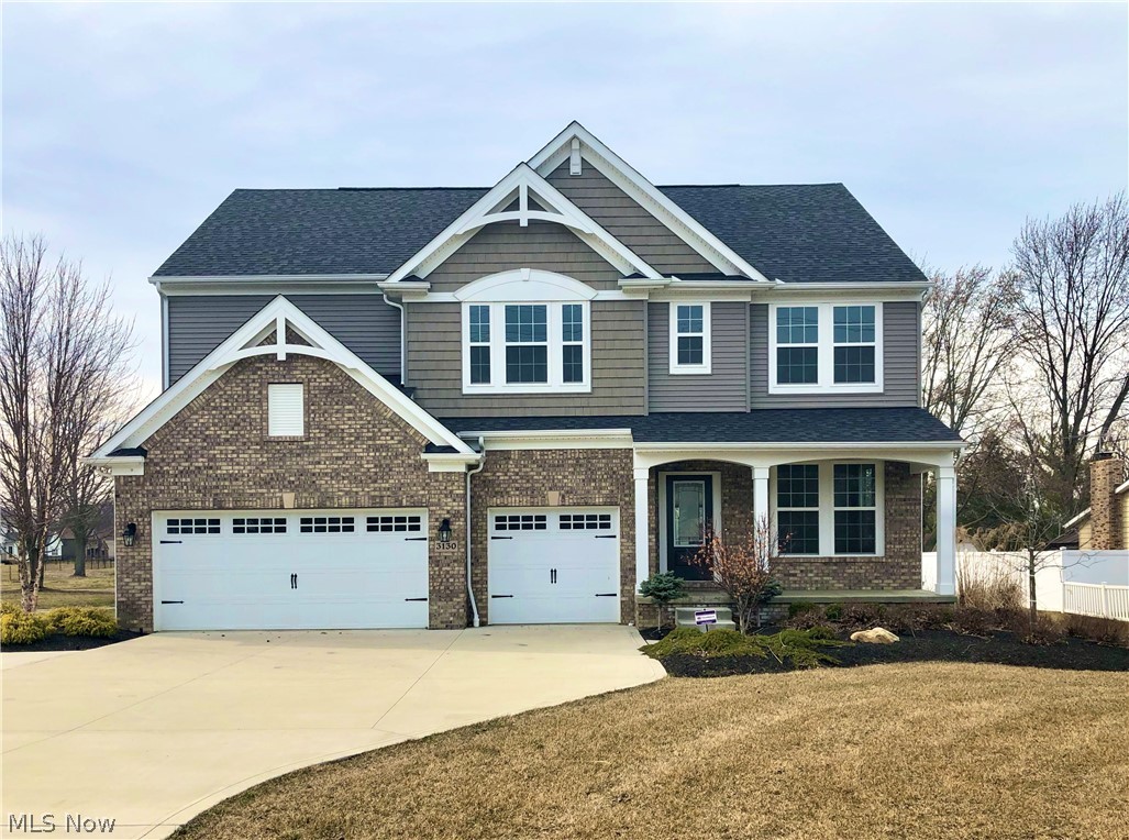 Take advantage of this former model home on a secluded lot within walking distance to desirable Mcintosh Farms!  This like new home boasts all of the upgrades including custom trim, crown molding, hardwood floors, gas fireplace, and vaulted ceilings. The kitchen is a chef's dream and features white cabinetry, quartz countertops, large center island, and built in stainless steel appliances. Four bedrooms up plus bonus room, and a large finished basement downstairs for additional living space! Outside you have custom landscaping, sprinkler system, and a private rear deck.  Close to shopping, interstates, and all that Avon has to offer!