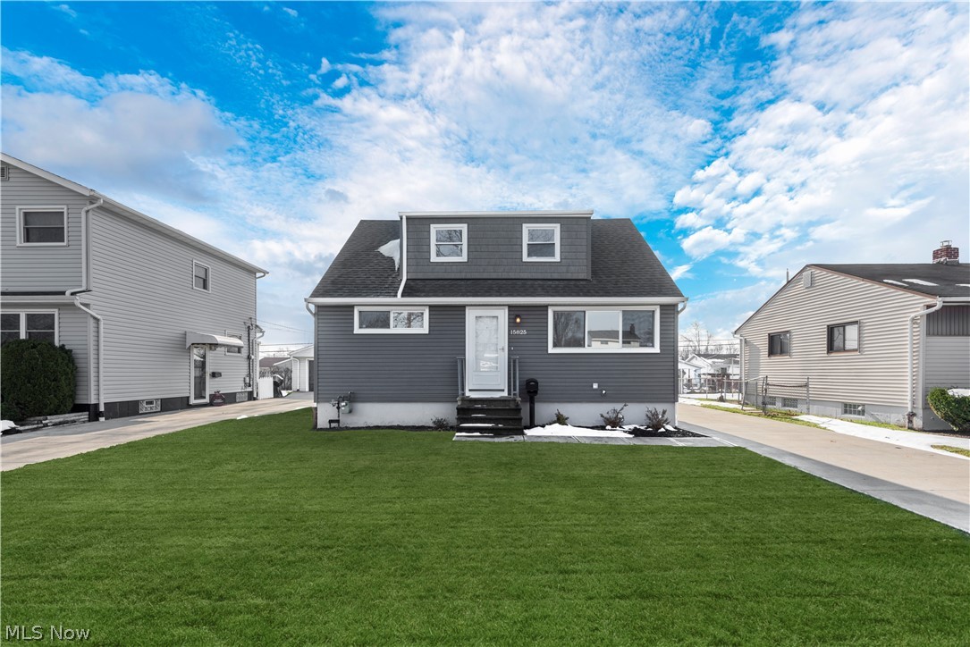 Welcome home to this rare turn key gem in the center of Brook Park. This spacious cape cod has so much to offer. Every detail was carefully selected and quality crafted. Highlights include fresh paint throughout with lovely neutral colors along with a newly updated eat in kitchen complete with new ceramic flooring and soft close cabinets.  The main floor bathroom has new flooring with bright white tiles that surround the tub, new sink and light fixture. Brand new carpet throughout the living room and 2 bedrooms complete the main level. Make your way up to the 2nd floor where an oversized loft style room(s) await. Complete with plenty of storage and lots of natural light. Entertain with ease in the finished basement that includes a full bath/shower and laundry hook ups. The private fenced in backyard is perfect for simply relaxing on a warm summer night. You'll also love the convenience that comes with your oversized two car garage. Located in a great neighborhood near it all with the M