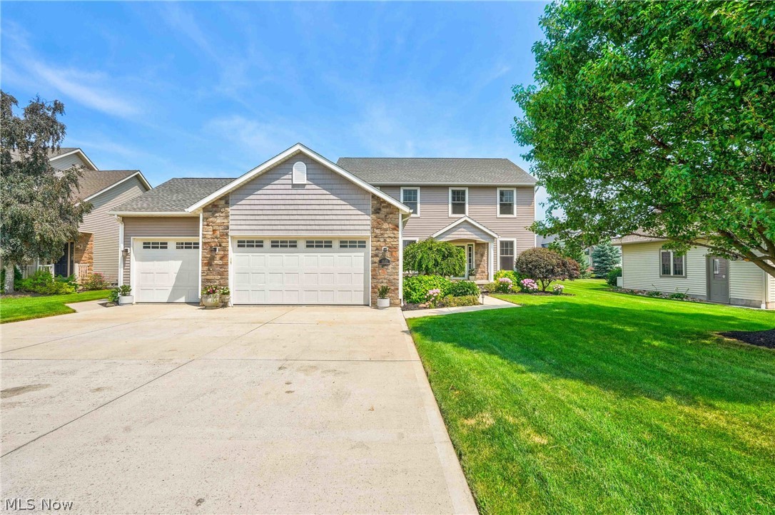 **Custom home in Catawba Place offering dual primary suites (1st & 2nd floor), 5 bedrooms, 3.5 baths, 2,784 sq. ft. plus a full finished basement, and an oversized 3-car garage!** The open-concept layout is ideal for entertaining, with a spacious great room seamlessly flowing into a gourmet kitchen featuring crisp white cabinetry, elegant granite countertops, under-counter lighting, a large center island, generous storage, and a full suite of appliances—including a beverage refrigerator. Light-filled interiors with bright coastal décor create a warm, inviting atmosphere throughout the home. French doors from both the kitchen and first-floor primary suite open to a generous 34' x 12' deck—perfect for outdoor gatherings and relaxing evenings. Additional highlights
include custom bathrooms with tiled showers, a 33' x 24' 3-car garage with built-in cabinets, and a finished lower-level recreation room complete with a wet bar, Skee-Ball game area, and massive storage space. The basement is pre-plumbed for a future bath.
**Recent Updates:** Roof (2013), HVAC (2024), Basement fully refinished with new flooring, drywall, insulation & paint (2025), Sump pump & backup (2023/2025), Dishwasher, disposal & microwave (2025), Beverage fridge (2023), Garage refrigerator (2025)
**Prime Location & Lifestyle:** Just a quick golf cart ride to Gem Beach Marina for dockage and Lake Erie access, and directly across Nor’Easter Cove from the Catawba Island Club (CIC) Golf Practice Facility. Enjoy the best of Catawba Island living right from your doorstep! Most furniture is negotiable
