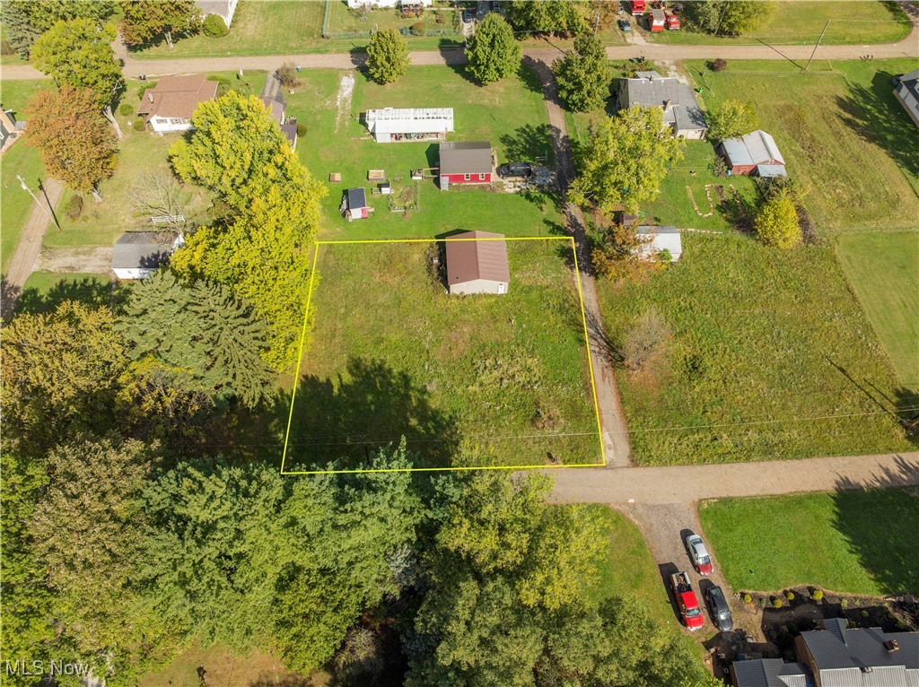 Corner Lot Opportunity in Washington Township! Discover the perfect spot to build your dream home on this .33-acre corner lot located in the Marlington School District. The property includes a 2-car garage, a public sewer line, a well, and offers plenty of space and potential for new construction. Enjoy peaceful township living with convenient access to nearby shopping. A great opportunity to create the home you’ve always envisioned! Buyer to do their own due diligence on land use.