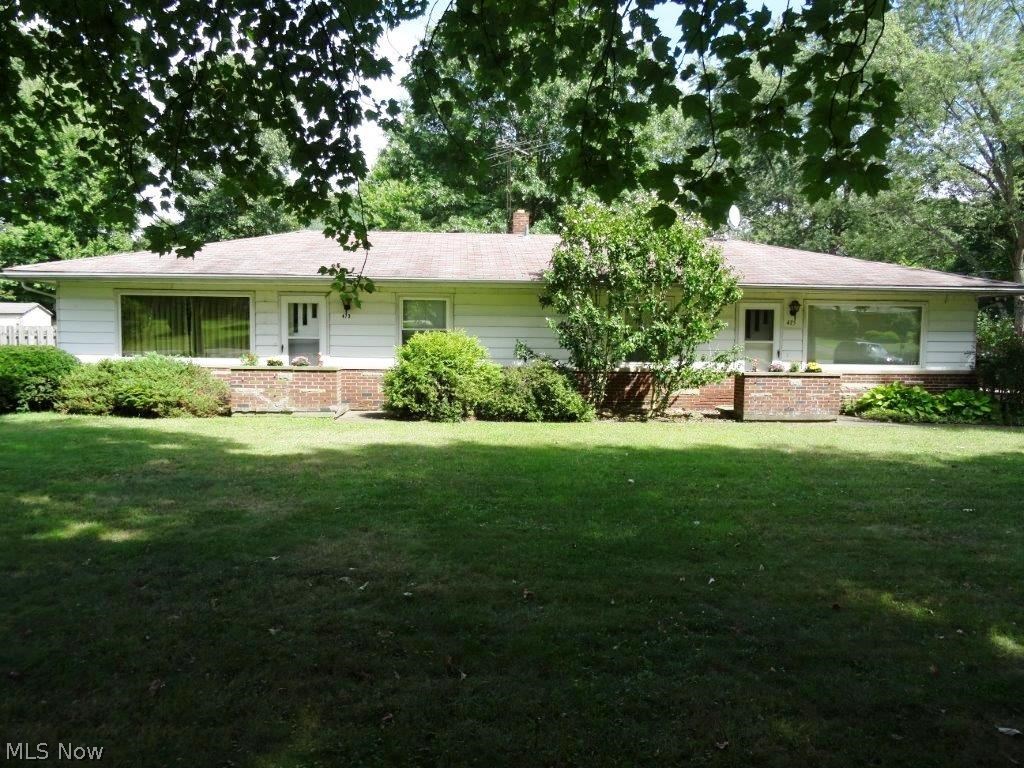 Wonderful turnkey investment property priced to sell now! Fantastic twinplex on a huge scenic lot in Kent.  Interior of both units completely repainted (all surfaces) 2016, all NEW carpeting both units 2016, landscaping completed with edging/trimming 2016.  Both sides feature private decks, all kitchen appliances AND washer/dryer sets, built-in wall air conditioning units, and one side offers a wood burner as well as forced air heating (both sides).  Huge yard with room to spread out, oversized 2 car garage with workshop, and additional storage shed.  This rare opportunity offers many potential options - could be great for an investor, owner occupant who would like additional income, or family who needs an in-law suite!