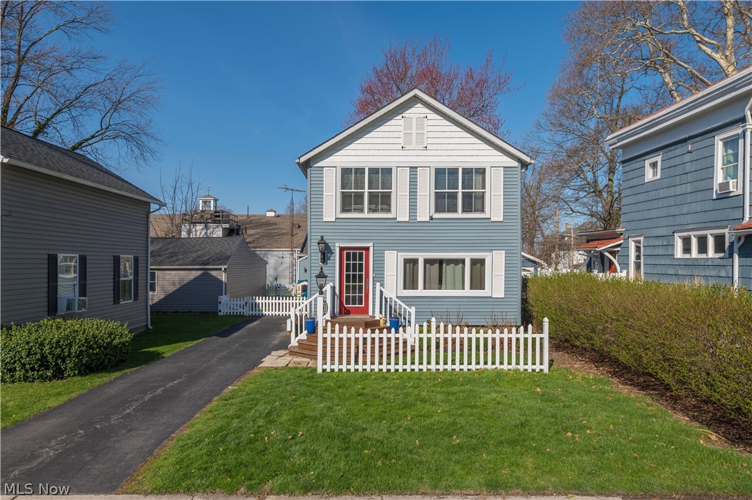 Live in the heart of Vermilion’s Harbor Town District in a home unlike anything else on the market.

This historic gem dates back to the late 1800s and was originally built near Fisherman’s Bend before being relocated in the 1920s. Inside, you’ll find true maritime craftsmanship with peg-and-beam construction and solid oak ship-style materials you simply can’t replicate today.

The interior offers a bright, open layout featuring a gas fireplace in great room, spacious kitchen (all appliances stay), first-floor laundry, and beautiful natural oak trim throughout. Upstairs, you’ll find a true owner’s suite, plus two additional large bedrooms with a shared full bath, along with an awesome open loft area—perfect for a reading area, office, or play space.

Fully updated for modern living, this home features a long list of improvements including: Roof – 2025, Water Heater – 2023, New Carpet – 2022, New Driveway – 2022, Fence - 2022, Appliances - 2019, Furnace & AC - 2014, Windows & Exterior Doors – 2014, Luxury Vinyl Plank – 2014, Drywall – 2014, Vinyl Siding – 2014, Solid Oak Trim – 2014, Whole house insulation - 2014

Step outside and you’re just moments from everything—local shops, restaurants, the public beach, and Vermilion’s beloved summer events.

Historic character. Modern updates. Unbeatable location.

This is harbor town living at its finest.
