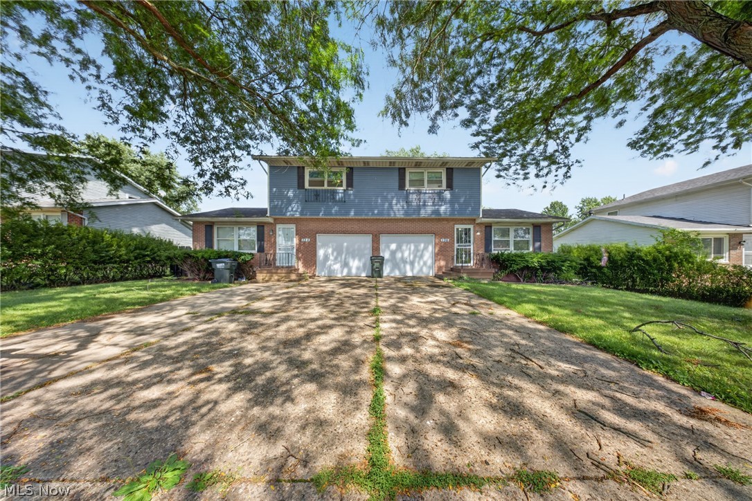 Spacious, versatile, and highly profitable income property nestled in a charming, well-established Louisville neighborhood! This incredible investment opportunity features three distinct units—consisting of two 2-bedroom units and one 1-bedroom unit—with three separate entrances and two separate attached garages. Perfect for savvy investors or owner-occupants looking for a stellar house-hack with strong cash flow from day one, the building features recent premium updates for total peace of mind, including a waterproofing system, a new sump pump, and new storm doors. Outside, the expansive backyard serves as an outdoor oasis designed for ultimate relaxation and entertaining, featuring a private patio, an oversized deck, a sun porch, and a convenient storage shed, while a wealth of extra off-street parking easily accommodates all tenants and guests. This well-appointed duplex/triplex won't last long—schedule your showing today!