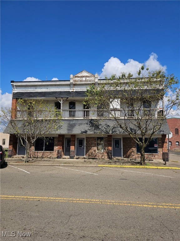 Attention Investors Great opportunity to put in some sweat equity and create a great cash flowing property for years to come. Great location on main St. Potential for 8 to 12 units. Seller is willing to Owner Finance or land contract. 
Property next door is for sale as well owned by different owner would be great business opportunity.