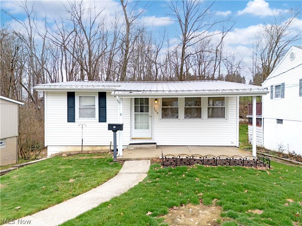 New Listing Opportunity awaits you!  This 2-bedroom home offers convenient one-level living with 672 square feet and plenty of potential to make it your own.  The home features a comfortable living room and kitchen that includes a refrigerator microwave and range.  
 
A full Walkout basement provides great storage space and flexibility, and the washer and dryer will remain with the home for the next owner.  Outside, a storage shed is included for additional storage.

Built in 1955 and connected to public water and sewer, this property is a great opportunity, IMMEDIATE possession available at time of title transfer.

Located near schools, orchards, parks, recreation center, downtown amenities, this property offers the charm of small-town living with easy access to surrounding communities.