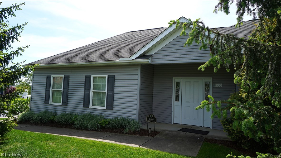Welcome to easy, low-maintenance living in the desirable Stonegate Reserve community in Tallmadge! This free-standing ranch home offers true single-floor living with 3 bedrooms and 2 full baths, thoughtfully designed for comfort, convenience, and accessibility. The HOA handles lawn care, common area maintenance, and trash removal, allowing you to spend more time enjoying your home and less time worrying about exterior upkeep. Step inside to a welcoming entry with luxury vinyl plank flooring that continues through the kitchen, dining room, and laundry area for style and durability. The family room and all three bedrooms feature comfortable carpeting, creating a warm atmosphere throughout the home. The fully equipped kitchen offers ample cabinetry, generous counter space, and a breakfast bar peninsula, making it ideal for everyday living and entertaining. The dining room includes a sliding glass door leading to the rear patio, perfect for relaxing outdoors or enjoying your morning coffee. The primary suite serves as a private retreat with a large walk-in closet, en-suite bathroom, and direct access to the rear patio. One additional bedroom offers direct access to the guest bathroom, providing flexibility for guests or multigenerational living arrangements. The guest bathroom features an American Standard Liberation Therapy Tub installed in 2019 for added comfort and accessibility. A main floor laundry room further enhances the home’s functional layout. Accessibility-focused features include 3-foot-wide doorways, strategically placed grab handles, an approach ramp in the garage, and the therapeutic walk-in tub. Additional improvements include a heated garage with an epoxy floor, both installed in 2019. Leaf Filter gutter guards provide reduced exterior maintenance and added peace of mind. Combining thoughtful updates, functional living spaces, and low-maintenance amenities, this Stonegate Reserve ranch offers exceptional comfort in a sought-after community setting.