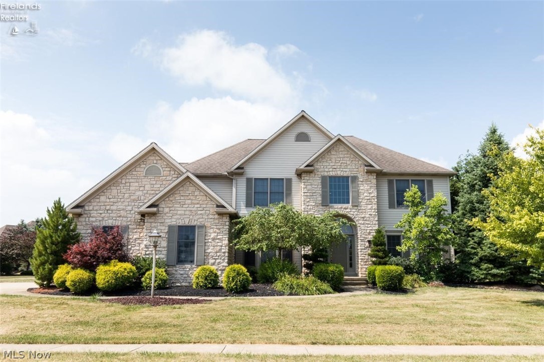 The moment you walk into this home you will be in awe! First floor features a grand foyer, formal dining room, living room, office with built in custom cabinets, large family room with vaulted ceilings & gas fireplace that is open to the kitchen & is a cooks dream! Kitchen features commercial appliances that include oversized gas range with 2 ovens, an additional double wall oven, granite counter & breakfast nook. Second floor has 4 bedrooms, two which are connected with a Jack & Jill bath. Master suite has a walk in closet, large bath with jetted tub, double sinks & shower. The basement of this home is amazing! Features include a wet bar with granite top, sauna, work out room surrounded by mirrors, full bath, game room, music room, play room, temperature controlled wine cellar and a newer stone patio for your entertainment. This home has something for everyone!