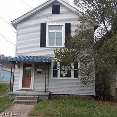 2 story home. Formal dining room, front and back porches and partial basement. Street parking. One street away from the river view. Seller does not intend on removing any of the personal items, selling as is.
