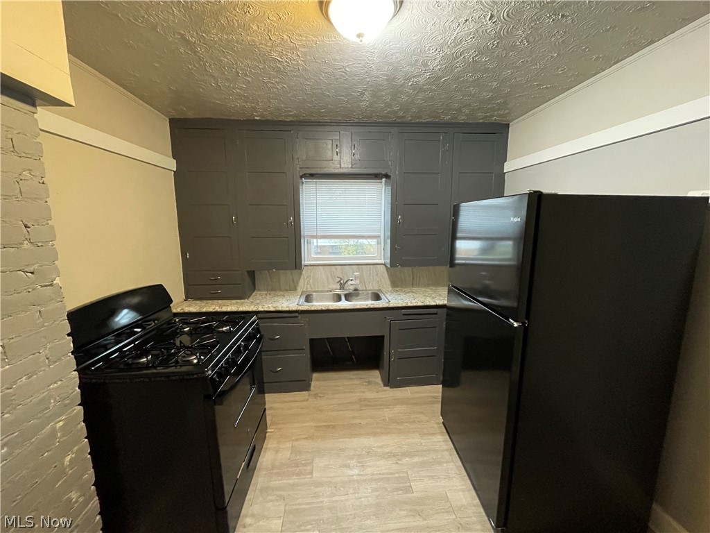 W J Langs Denison Ave Sub - Residential Lease