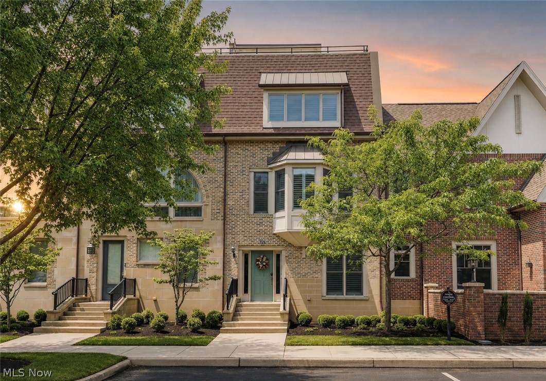 Experience luxury, convenience, and turnkey living in this extensively renovated townhouse-style condo located in the highly desirable Westhampton community at Crocker Park. Offering 2,556 square feet of beautifully updated living space, this exceptional home features 2 bedrooms, 2 full baths, 2 half baths, a private main-floor office, and a finished lower level perfect for additional living, entertaining, or work-from-home flexibility. Completely transformed in 2024, the home showcases all-new wood flooring throughout the first and second floors, a stunning designer kitchen featuring new cabinetry, granite countertops, and premium Thermador appliances. The luxurious primary suite serves as a private retreat with a fully remodeled spa-inspired bath complete with a steam shower, built-in bench, double vanity, and heated floors. The guest bath has also been thoughtfully renovated and features a whirlpool soaking tub, while an additional bathroom received stylish updates including new fixtures, flooring, and countertops. The inviting main living area is enhanced by a custom electric fireplace with tile surround and built-in accents, creating a warm and sophisticated atmosphere. A private main-floor office provides the perfect space for remote work or study. Upstairs, enjoy access to a rare third-floor walk-out rooftop balcony, offering an ideal outdoor retreat for relaxing, entertaining, or taking in the vibrant Crocker Park atmosphere. Additional upgrades include a new tankless hot water system, security system, water softener, garage cabinetry, and an electric storage pulley system. Every detail has been carefully considered, making this home truly move-in ready. Located just steps from Crocker Park's premier shopping, dining, entertainment, restaurants, and year-round events, this meticulously maintained residence offers the perfect blend of upscale finishes, low-maintenance living, and an unbeatable Westlake location.