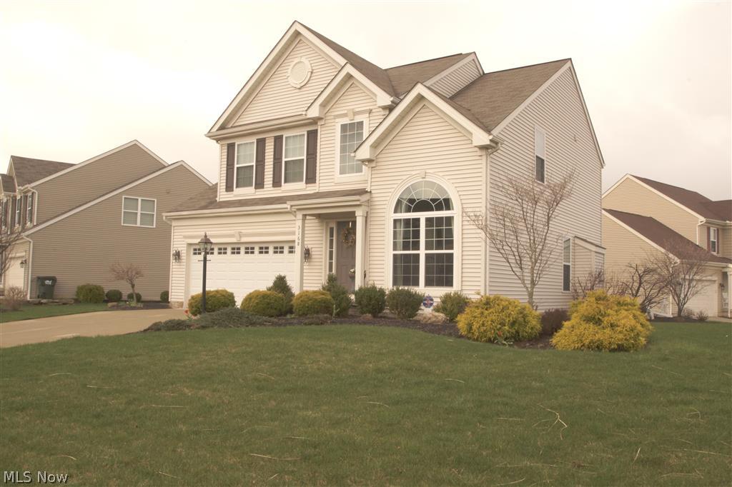 Lovely, well maintained home on corner lot.  Beautiful formal dining room with 12 ft. ceiling, wood flooring and floor length Palladium window. First floor has spacious open floor plan. The great room has a gas fireplace, kitchen has wood flooring, an island, maple cabinetry, decorative countertops, built in desk area, a large pantry, stainless steel appliances and a sunroom with a cathedral ceiling and wood flooring off the kitchen. Access backyard patio from sunroom. First floor laundry room and half bathroom. The second floor features four bedrooms. Spacious master suite has cathedral ceiling, plant shelf and sitting area. Master bathroom has double vanity with marble countertop and ceramic flooring. Alarm system. 9 ft. poured basement walls. Glass block vented windows. Rain Bird sprinkler system. Hyde Park features a park-like setting with a  pond, gazebo and walking path. Playground.