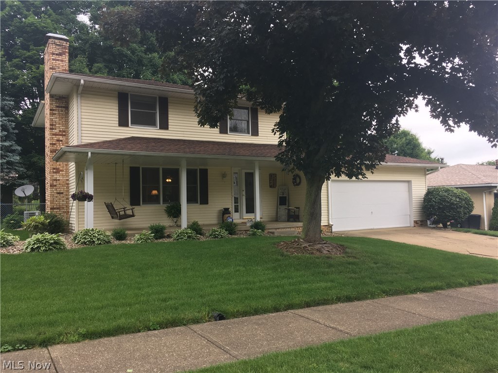 A must see!  Spacious 3 bedroom, 2.5 bath 2 story home.  Wood laminate flooring in the living room, new in 2017.  Updated kitchen with new counters and sink in 2018.  The kitchen opens to the dining room with french doors to the back deck, new in 2018.  His and hers closets in the master bedroom with remodeled full bath.  Finished family room with brick fireplace in the water proofed lower level.  A fourth bedroom or office is also located in the lower level along with plenty of storage space.  Fence enclosed backyard.  2 car attached garage.  New roof in 2017.  New furnace and air in 2015.  New hot water heater in 2018.  Excellent south side location.  Move in ready.