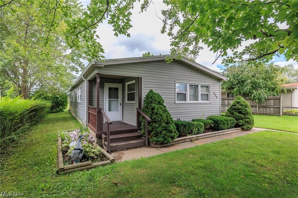 Welcome to this beautifully remodeled ranch home! This home has over 1300 sq ft of living space, with 3 bedrooms and 2 full bathrooms. The kitchen has been upgraded with updated cabinets, new countertops, a new sink and new flooring. New carpet has been installed in the dining room, living room, and hallway. The entire house has a fresh coat of neutral paint throughout. Both bathrooms have been tastefully updated as well. Outside, enjoy either covered porches, one on the front and one on the side. There is a paved 3-car parking pad and the lot backs up to the golf course. The Pheasant Run community also has tons of amenities to enjoy such as golfing, fishing one of the lakes, grabbing a bite to eat at the Inn, or hosting a picnic at the pavilion with a playground and basketball court! Seller offering closing cost assistance, amount negotiable. Schedule your tour today!