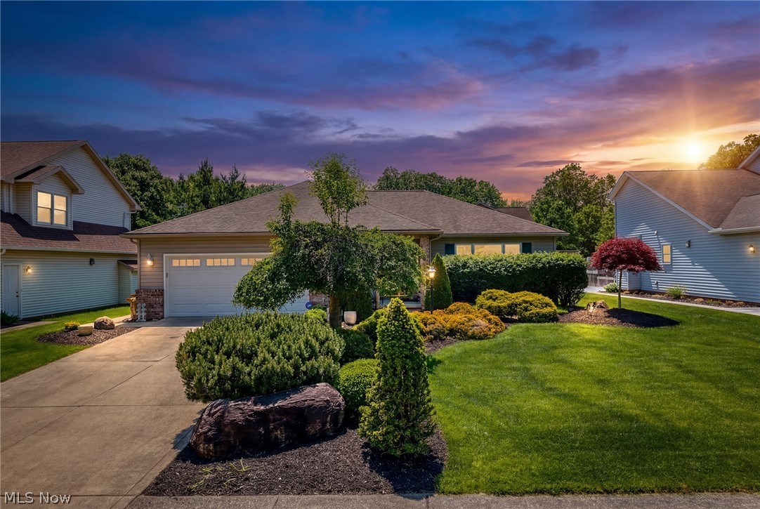 Welcome to this impressive newly updated and well-maintained 2-bedroom brick ranch w/full basement & 2-car attached garage nestled on a beautifully landscaped fenced lot, complete with shed. As you enter, you’re greeted by a welcoming foyer that flows seamlessly into the open concept living and dining, family room and kitchen w/breakfast bar and stunning granite counters, refaced soft closed cabinets & HW floors. Remodeled 2016 - perfect for hosting gatherings. The cozy family room, featuring a gas fireplace, opens to a private patio adorned with a Trex deck, overlooking a fully fenced yard with lush landscaping. Originally a three-bedroom layout, the seller has thoughtfully converted it into two bedrooms, including a remodeled accessible in-suite master bathroom and an additional closet. (The wall can easily be reinstalled for a third bedroom if needed.) The second bathroom is remodeled. Hardwood throughout 1st floor including kitchen. Ceramic in family room and laundry.  Improvements include - roof tear off & gutters 2017, stamped concrete patio 2019, Trex deck & vinyl railing 2018, shed 2019, garage door 2018, furnace 2018. Additional improvements in supplement Don’t miss your chance to make this charming residence your own!