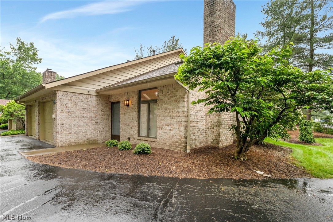 Great condo in perfect location. Move in ready and close to the heart of Boardman and close to Canfield.  Features include Open concept kitchen with Granite counter tops same granite is in both baths and laundry area. Stainless appliances and microwave do stay. Breakfast bar allows even more room for entertaining.  Room for dining between great room and patio.  Large great room with vaulted ceilings and new luxury vinyl  flooring throughout along with a Gas brick fireplace in main room as well.  Large screened in private patio. New central air and water tank. Small dogs and cats welcome. Washer and dryer conveniently  located in hall between garage and 1st floor 1/2 bath that are included. Primary bedroom on 2nd floor has over sized double walk in closet with large storage space. Second bedroom and full bath also on second floor. Schedule your showing asap before it’s going going gone.... Seller has requested highest and best offers by 6 PM 6-19-24