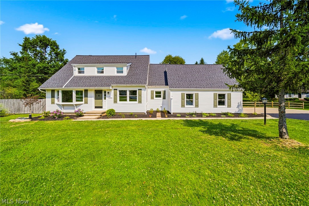Step into this Stunning, move-in-ready home! Located in the highly sought-after Kenston School District. A lot of love & care has been put into this beautifully renovated home, from top to bottom, allowing you to enjoy all the modern improvements without the work. The moment you arrive, you'll feel right at home. Thoughtfully redesigned w/quality finishes throughout, each rm offers its own warm & inviting space. Natural light fills the spacious living rm and the formal dining rm for those family gatherings. The cozy family rm features a charming brick wood-burning FP w/a beautiful wood mantel & built-in custom cabinets, the perfect place to relax. The completely renovated kitchen features Corian countertops, updated cabinetry w/undermount lighting & stainless steel appl's, blending style & functionality for everyday living. The 2nd flr features refurbished hardwood flooring throught, generously size BR's. & a versatile den that provides additional living space. The 4th BR offers additional private entrance from the garage. The Primary BR offers 2 walk-in closets & ensuite w/dbl vanity & tiled walk-in shower. Step through the sliding glass doors onto the newly built deck overlooking the private, partially fenced backyard.  The deck flows seamlessly to a spacious patio, creating the perfect outdoor space for entertaining or simply enjoying the peaceful surroundings on your 1.61 ac lot. Extensive updates include a new roof, furnace, central air conditioning, int & ext paint, recess lighting, interior doors & trim throughout, updated flooring, & all 3 bathrooms have been renovated. The large basement features a Finished Rec. rm, abundant storage space, crawl space for additional storage, and durable epoxy-coated flooring, making it as functional as it is clean & well-maintained. All newer plumbing. New electric panel in 2014, w/updates in 2025, including new switches and outlets. New landscaping. Let's not forget, the automatic standby generator. Begin your story here!