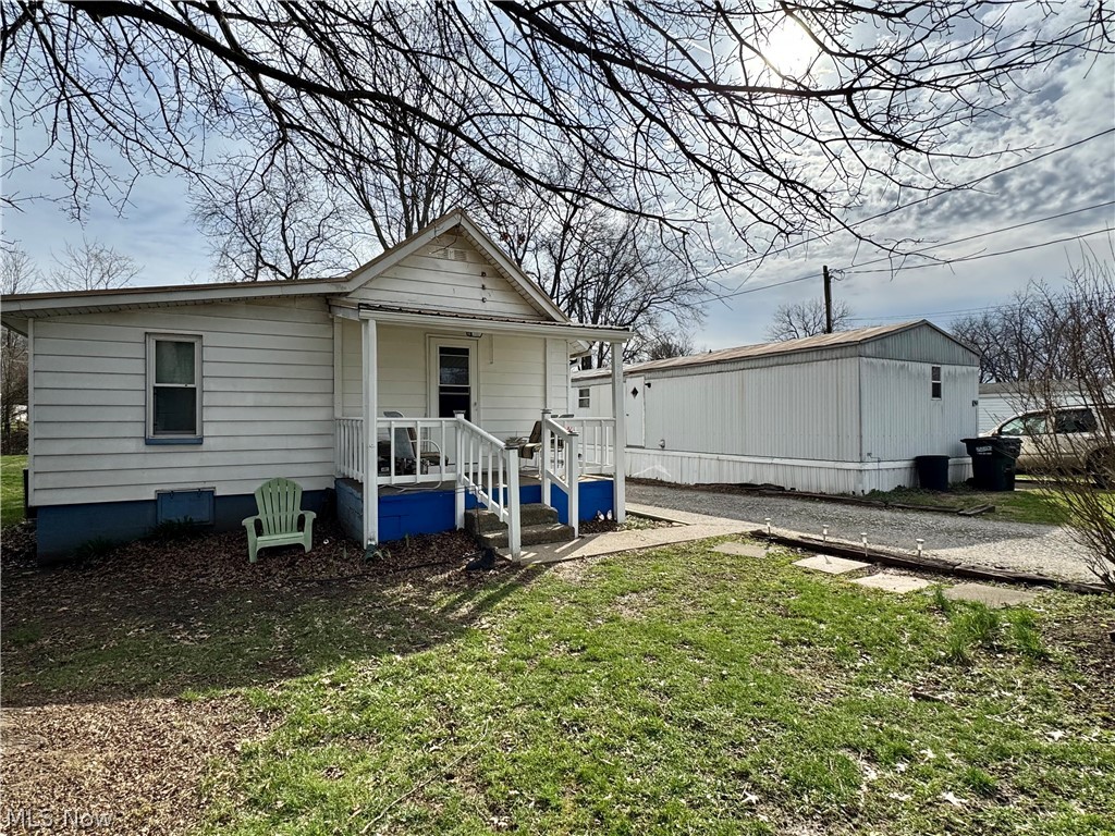 This property offers a single family home and a 1989 Skyline single wide mobile home on separate parcels. The white ranch has been well maintained and features 3 bedrooms and 1 bathroom. The tenants signed a one year lease March 1, 2026. They pay $650 per month and cover the utility bills with the exceptions of water and trash. This property has fuel oil heat and central air. The mobile home offers 3 bedrooms and 1.5 baths. The tenant occupying this has been within the space for more than a year, is on a month to month agreement, pays $525 and covers all utilities with the exceptions being water and trash. The sellers cover the trash bill every 3 months and it averages $94 per month, per unit. The sellers also pay the water bill which averages $50 per month, per unit. This property has propane heat and no central air. The two properties have city water and one septic system is shared between the two properties.