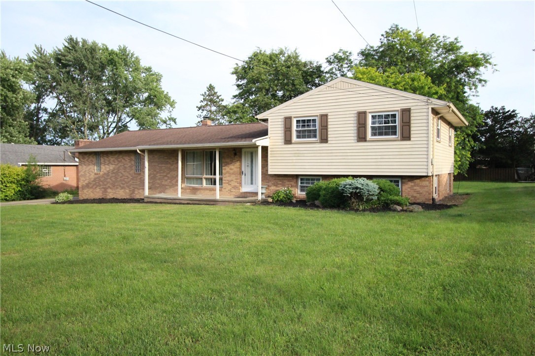 Solid brick home ! Welcome home to this beautifully updated 4-bedroom, 2-full-bath split-level situated on an expansive nearly half-acre lot! Offering a versatile floor plan, the upper level features 3 spacious bedrooms and a full bath, while the lower level includes a large family room, an additional bedroom, and a second full bath—perfect for guests, extended family, or a private home office.

The home has been thoughtfully updated within the last five years, including the kitchen, upper-level bathroom, and flooring throughout the living areas (2021y) . Recent major improvements include a new central air conditioning system (2025), elegant French doors with built-in blinds (2023) that provide abundant natural light and convenient access to the backyard.

Step outside to enjoy the large newly painted deck overlooking the expansive backyard, offering plenty of space for outdoor entertaining, family gatherings, gardening, or simply relaxing in your own private retreat.

The attached two-car garage is equipped with water service and electrical outlets, providing added convenience for projects, hobbies, or extra storage needs. Public water and public sewer services offer worry-free living. And one year home warranty provided . 

Conveniently located near shopping, dining, parks, and everyday amenities, with easy access to major highways for commuting.

Don't miss this incredible opportunity—schedule your private showing today. This one won't last long!