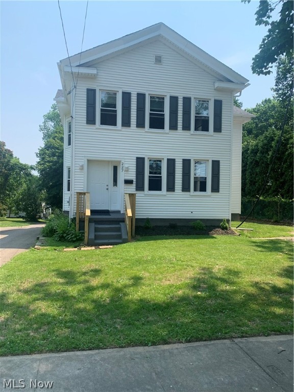 This classic Highland Square area 2200 sq ft home has been brought back to life. New items include roof, gutters, carpeting or LTV in all rooms, sump pump, 220 electrical service and panel, all light fixtures and ceiling fans, hot water tank, most windows have been replaced, and more! Luxury vinyl tile leads you from the entry way through the dining room, where an abundance of natural light shines through all of the large windows. The completely remodeled kitchen provides plenty of counter space and storage with the new center island. A convenient first floor laundry room is between the kitchen and first floor bath. Off of the kitchen is a  covered deck that will allow for outdoor entertaining rain or shine. Upstairs you'll find four large bedrooms and a beautifully updated bathroom.  2 bedrooms have additional spaces that look over the yard and could easily be used for reading rooms or home offices. The walk out basement provides plenty of space for storage as well as room for a works