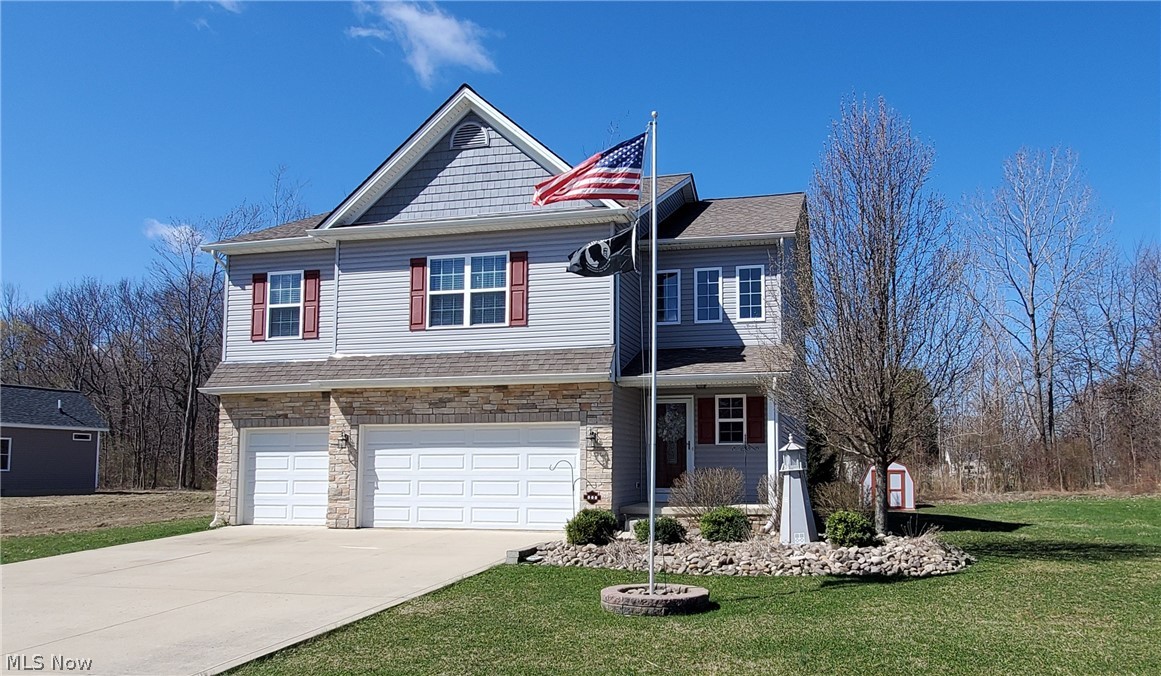 This beautiful 4 bedroom 2.5 bath colonial in lovely Lake Erie Shores is it's next owner.  This Knez built home is everything you have been searching for and more!  From the large bedrooms, to the ample storage space throughout.  The home features a 3 car garage, 16x18 deck with a natural gas grill accessed through the french doors off the dining area, Extra windows have been added in all the bathrooms allowing in wonderful natural light, and upgraded doors.  The large unfinished basement has a 30 year transferable warranty through the year 2040.  New carpet in the living room was done December 2020.  Absolutely nothing to do but move in, make sure to add this to your home tours today.