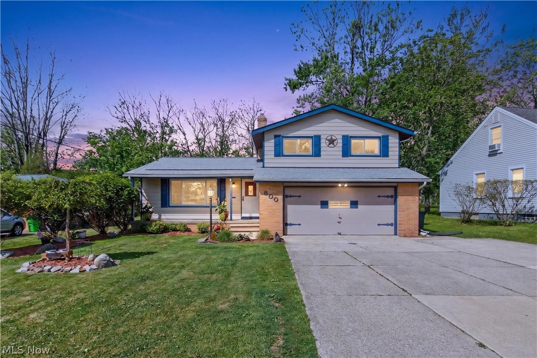Welcome to this beautifully designed split-level home, offering the perfect blend of spacious living and functional design. The main level boasts a bright and airy, spacious living room that flows seamlessly into the kitchen, which comes fully equipped with modern stainless steel appliances.

A standout feature of this property is the bonus fully enclosed patio—flooded with incredible natural light from a wall of windows—which conveniently connects to a secondary lower-level living area, making it an exceptional space for entertaining or relaxation. The home features 3 comfortable bedrooms and 2 full bathrooms.

The lower level adds fantastic practicality with dedicated laundry space and abundant storage options. Complete with a full basement and a spacious 2-car garage, this home offers all the room and versatility you need.