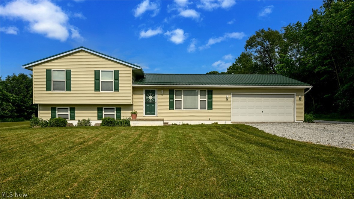 Welcome to your private country retreat on 10 beautiful acres in Liverpool Township! This well-maintained split-level home offers the perfect blend of comfortable living and equestrian-agricultural functionality.

The 4-bedroom, 2-bath home features an open and inviting floor plan with updated flooring throughout the main living areas, a spacious living room filled with natural light, and a stylish kitchen with quartz countertops, ample cabinetry and workspace. The adjoining dining area overlooks the picturesque backyard, while the lower-level family room provides additional living space for relaxing or entertaining.

Step outside to enjoy peaceful country views from the covered patio, ideal for morning coffee or evening gatherings. The property is thoughtfully set up for horses or other livestock, featuring a barn with multiple stalls, fenced pasture areas, and an outdoor riding arena. This property offers endless possibilities.

A long gravel drive leads to the home and barn, providing privacy and easy access. The barn, expansive pasture, and level acreage create an exceptional setting for livestock, hobbies, or recreational use. Barn has 9 stalls (some matted), a hot water wash rack, and an RV hookup. An added bonus is the private gas well on the property, which provides free natural gas to both the house and barn—offering significant savings and added value.

This rare property offers country living with modern comforts and room to roam. Bring your animals and make your rural lifestyle dreams a reality!
