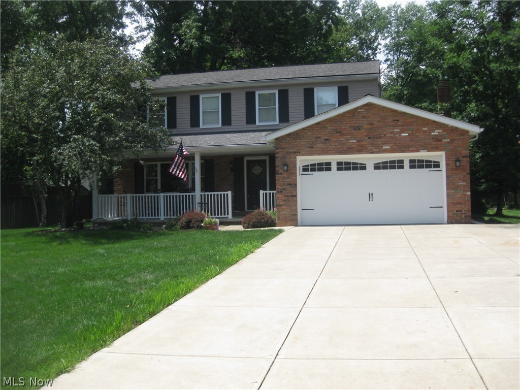 Welcome home! Beautiful 4 bdrm, 2 1/2 bath Colonial completely remodeled! This home offers laminate wood floors throughout the foyer, living room, dining room and kitchen. Remodeled kitchen with maple cabinets, granite counters and ceramic tile backsplash, all appliances, pantry and plenty of cabinet and counter space and a kitchen island. Family room is carpeted and has a WBFP. Remodeled laundry room and half bath on the 1st floor has tile wood plank flooring and tall vanity with marble top. Wet bar in basement. Huge master bedroom includes a walk-in closet, ceiling fan and master bath with tile wood plank flooring, shower and tall marble top vanity. All 3 bathrooms remodeled 2016 & 2017. Deck sanded and stained 2017, New garage door, lighted basketball hoop, new front porch and family room door 2016. Front phantom screen and windows 2014. Stamped concrete patio 2012. New HVAC and full basement waterproofed 2011. Kitchen 2010. New drive 2008. Roof tear off with 30 yr warranty 2004. HM