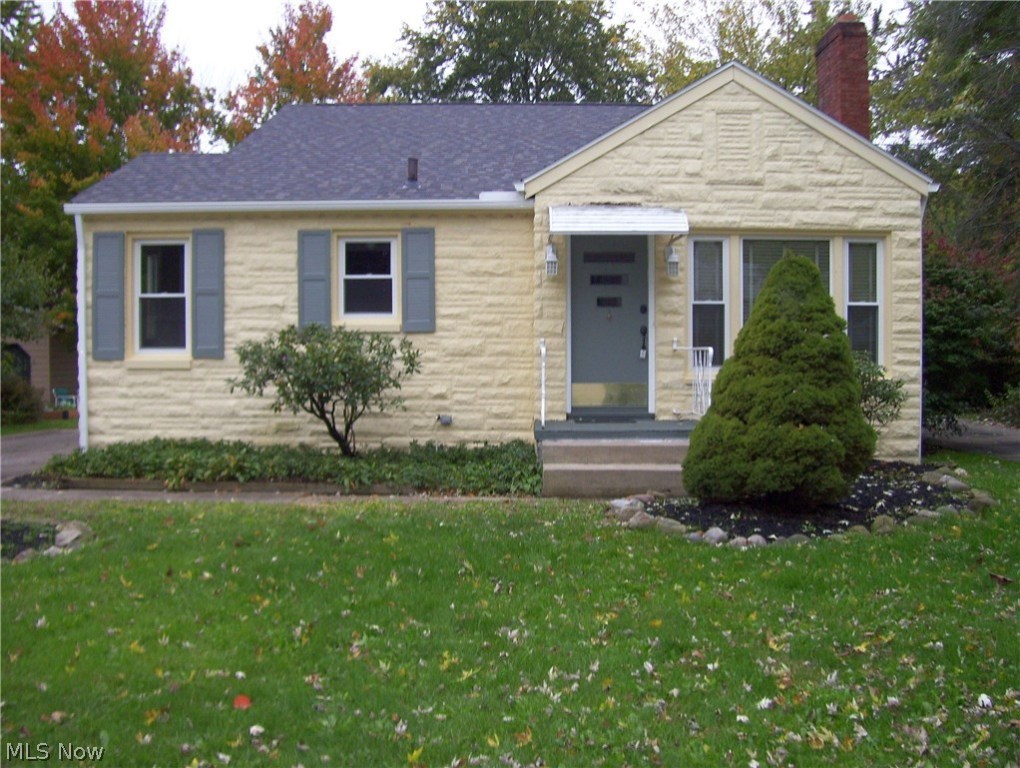 Move right in to this completely updated 3 bedroom, 2 full bath ranch. The living room is large with brand new carpet, neutral walls and a gas fireplace with new tile. The kitchen features the following updates:  new cabinets, countertops, stainless steel appliances, laminate flooring and lighting. There is ample storage here, as every bedroom has two closets. Brand new roof; new windows were just installed two weeks ago. The finished rec room on the lower level is additional living space and has a bar as well. There is a full bath on the lower level. The fenced back yard will give you privacy and the wooden deck out back is perfect for warm weather enjoyment. This home is in turn-key condition!