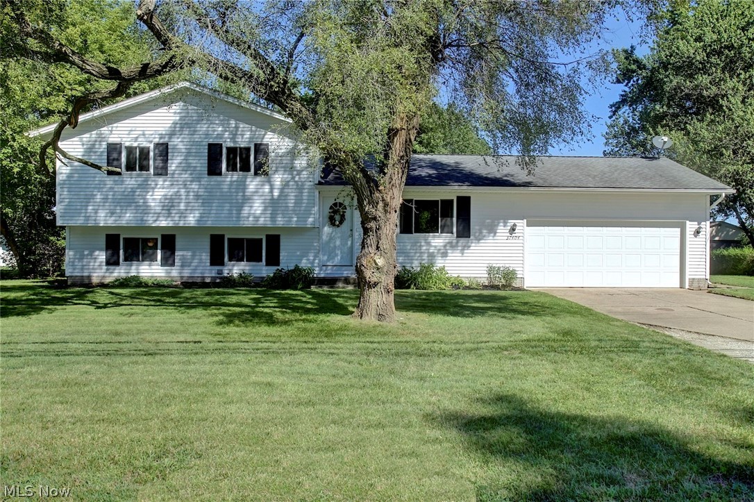 Perfect sized split-level starter home or possible investment opportunity in the city of North Ridgeville! Featuring comforting, neutral colors throughout the home. Includes 2 full bathrooms with updated lower level bathroom. Lower level walks out to the large, sprawling backyard. Newer roof, windows and new sump pump motors. Come and view today!