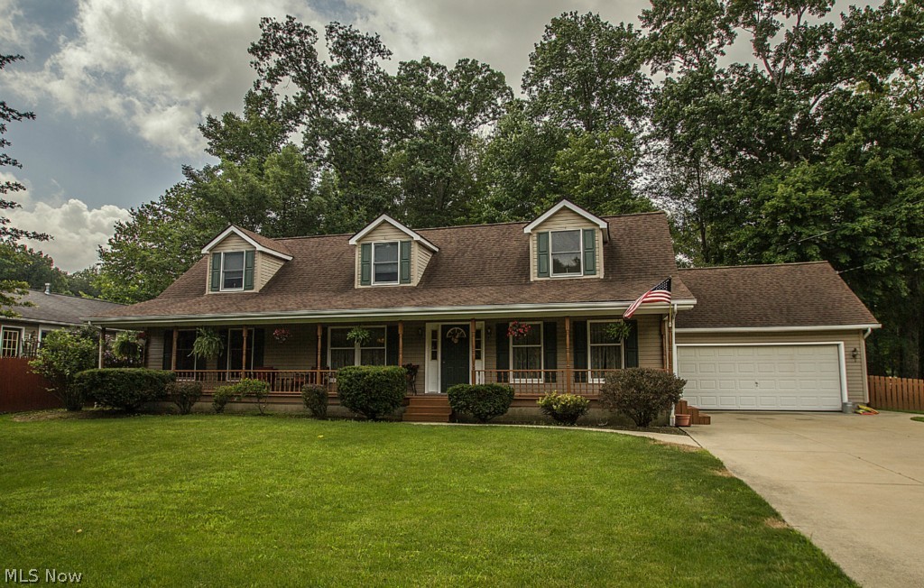 Welcome home to this charming spacious home in the heart of Stow!! You will love all the updates they've done recently including ceramic flooring in the foyer, kitchen, and dining room, new carpeting in all the bedrooms and family room, new counter tops in the kitchen, brand new fireplace inside and up to roof,  and many more! Plenty of outdoor space to enjoy and entertain. Country living with the front porch across the entire length of house, quiet dead end street, large lot 100x302! Large fenced area in yard with patio and plenty of treed area too! Sold with one year home warranty.  Feel like you have privacy in the country.... in the heart of Stow!