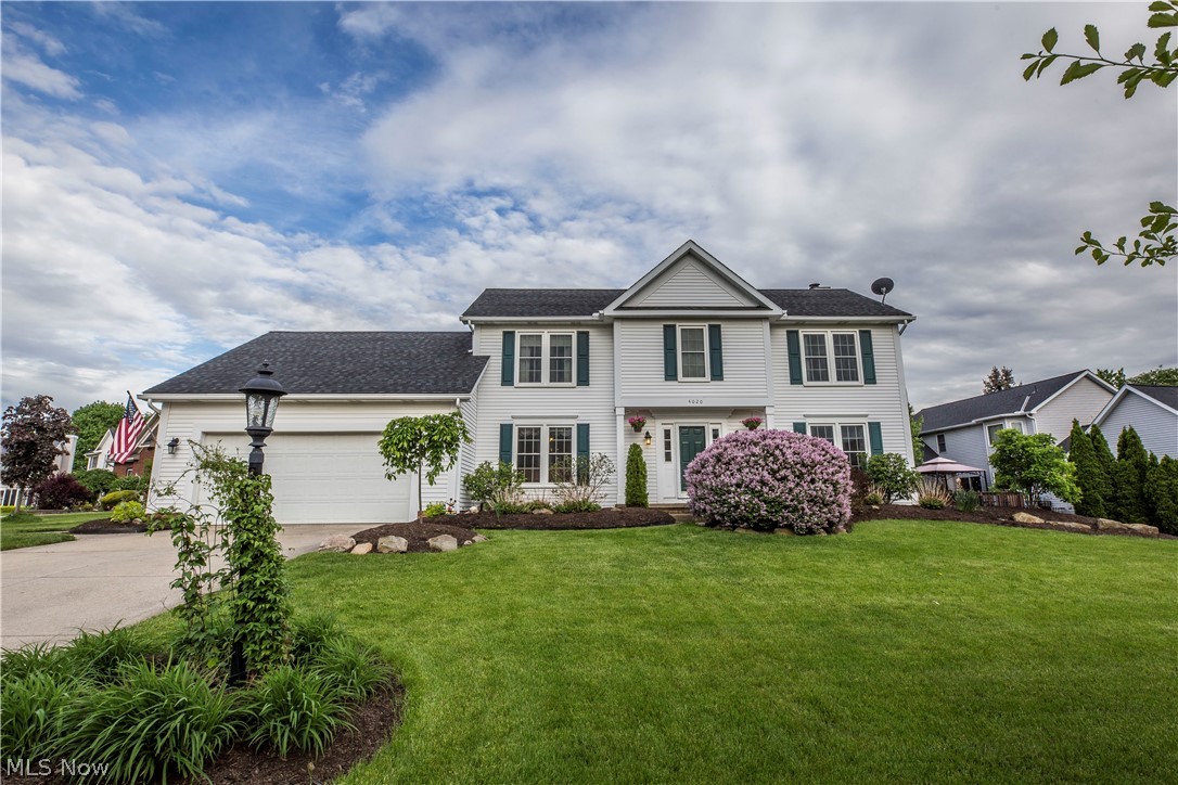 Welcome to 4020 Queensbury Cir! This beautiful 4 bedroom, 3 bathroom colonial is conveniently nestled in Kings Mill. Enjoy the spacious open floor plan from the living room to the kitchen which features corian countertops and plenty of natural light. The eat-in kitchen also has a sliding glass door that leads to the brand new stamped concrete patio and private backyard which is perfect for entertaining. The first floor also features the dining room, den/family room, half bathroom and laundry. Hard wood floors throughout the first floor living areas. Upstairs you will find the 4 spacious bedrooms including the master suite with walk-in closets, full bathroom with soaking tub/shower, and two sinks! The second floor also features the second full bathroom! All of this with an attached two car garage and plenty of parking. Call today to schedule your private showing!