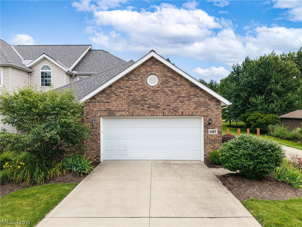 Welcome home to maintenance-free living in this updated 2-story townhome offering comfort, convenience, and exceptional community amenities. From the moment you arrive, you’ll appreciate the attached insulated two-car garage, private patio area, and attractive curb appeal. Step inside to discover an open and inviting floor plan designed for easy everyday living. The spacious eat-in kitchen features oak cabinetry, ample countertop space, newer refrigerator, and all appliances. The kitchen opens seamlessly into the impressive family room, where soaring vaulted ceilings, skylights with retractable window coverings, and a cozy gas log fireplace create the perfect gathering space. Accessibility and convenience are thoughtfully incorporated throughout the home with 36-in interior doorways designed to accommodate wheelchair access. The main level also features a convenient first-floor laundry room, half bath, and a spacious owner’s suite complete with a large closet and private full bathroom. Upstairs, you’ll find a generously sized 2nd bedroom featuring a walk-in closet and an additional full bathroom, making it ideal for guests, family members, or a private retreat. The finished lower level offers flexibility with extensive finished living space, a third full bathroom, and plumbing already in place for a future pub sink. Whether you need a home office, fitness area, or additional living space, this level provides endless possibilities. Recent updates include a new roof installed in 2025, central air conditioning replaced in 2020, and a newer hot water tank. A one-year home warranty is also included. Enjoy a carefree lifestyle in this desirable community where the association handles lawn care, landscaping, and snow removal. Residents also enjoy access to a pool, entertainment and gathering areas, and additional amenities. This move-in-ready home combines spacious living, thoughtful updates, accessibility features, and low-maintenance ownership—all in a wonderful setting.