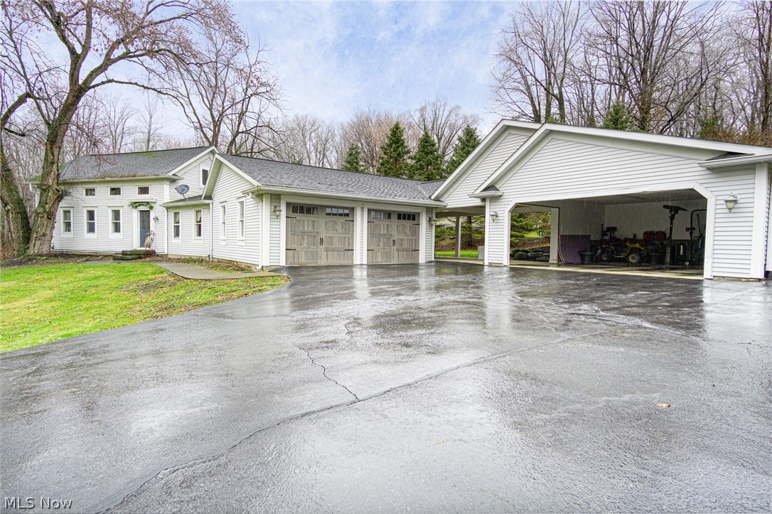 One of the most beautiful streets in Hubbard, Creed Ave! Welcome to this one of a kind house that is unlike any other house in the area. 1.52 acre lot, 4 bedrooms, 3 Bath, 4 car garage, basketball court, what more could you possibly want?!? As you walk in, you are greeted in the enormous family room with all new flooring and access to your covered patio, the ideal area to entertain! The kitchen is huge with floor to ceiling cabinets, large island and updated appliances ready for it's new master chef. Formal dining room and an additional living room/office space before entering into your first floor master suite. Your own private Oasis, the master bedroom is tucked away for you to enjoy your privacy. Upstairs offers 3 large bedrooms with great closet space and an newly updated bathroom. High efficiency furnace with central air, newer hot water heater, septic updates (2018) new flooring throughout (2018). Hubbard School District. Don't miss out on this one!! Houses on this street do not