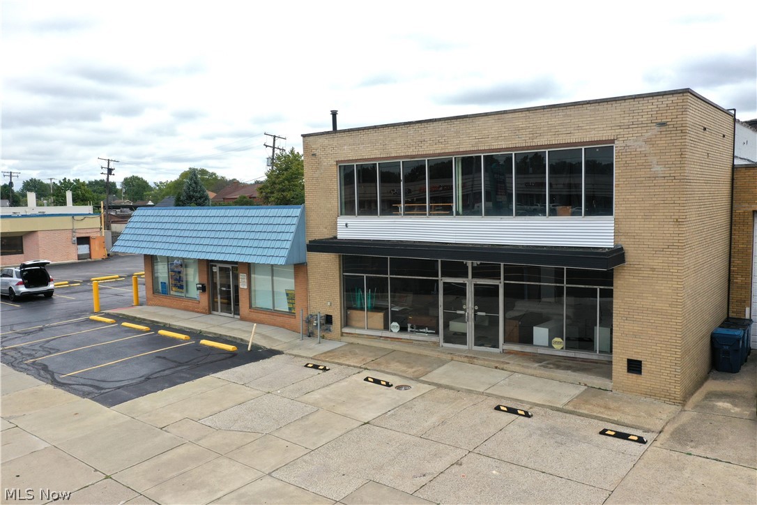 DON'T MISS THIS COMMERCIAL TRIPLE NET (NNN) ALL BRICK 2 STORY INVESTMENT!! 
This 2-story commercial property sits on one of Cleveland's highest traffic streets. Great visibility! 
This property boasts about $53,000 Gross Annual w/ 10.8% CAP. 2 suites w/ ~10,800 + sq feet retail/office and 3500+ sq feet open storage space in basement accessed by main floor unit and includes 6 off street parking spaces up front. This fully occupied turnkey investment is triple Net tenancy with $4,400 Mo/ $49,200 Annual Income. 
This low - to no maintenance asset is prime to add value and cash flow w/ no management and/or low maintenance to your portfolio.
1st Floor - Occupants: Main Floor - established Tabacco and Vape Retailer - 5-year lease (has been in business for 10 + years and uses the space for warehousing only. 
2nd Floor occupant - A well established and growing commercial photography / digital imaging company.  (Lease has 2 years left)
- Property Taxes - $3,743 
- Insurance -        $1,734 
Annually Each occupant has the balance of their lease with 5 and 2-year options respectively. 
No Delinquencies or back rents. 
Tenants pay for all utilities and maintenance. Deposits in escrow for all units.