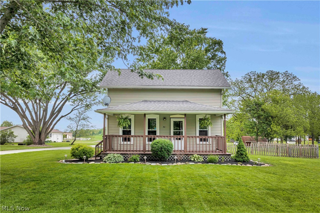 Welcome to 34 Verlin Street, a charming 3-bedroom, 1-bath home nestled in the quaint Village of Wakeman.  This move-in-ready gem offers convenient first floor living with a bedroom, full bath and laundry room on the main level plus two additional bedrooms upstairs.  The bright, inviting interior features numerous recent updates including fresh paint, newer carpet, updated light fixtures, new doors, updated outlets and switches.  Outside you will find an inviting covered porch, rear patio, and attached 2-car garage, all complemented by refreshed landscaping and excellent curb appeal. Whether you're a first time home buyer, looking to downsize or seeking a turnkey property, this home offers comfort, convenience and charm.  Don't miss the opportunity to make it yours-schedule your private showing today.