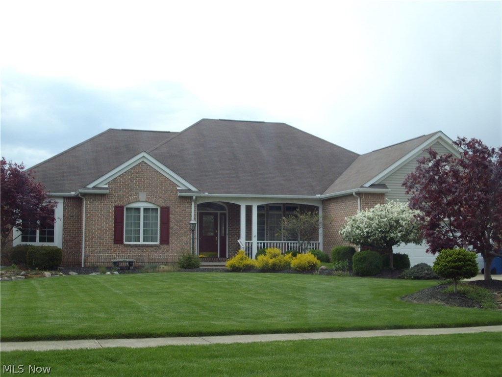 This is a one owner meticulously kept Ranch in Austin Estates Barberton is one of a kind. You will enter from a manicured yard to a  lovely front porch and into a large tiled Foyer an open Great Room with Cathedral ceiling, Brick fireplace, two skylight  enter into a dramatic dining room with double crown Oak molding and square Oak pillars separating the area. this home offers two full baths, three bedrooms, tested ceiling in the morning large Master Suite, two walk in closets, double sinks Jetted tub, separate shower and commode area. The home offers Oak Trim and six panel Oak doors throughout, the kitchen has Granite counter tops , large center Island, Stainless Steel appliances stay Plank laminate flooring, Pantry, stunning brick  fireplace in the Bayed Breakfast dinette, Double Oak Crown Molding and walk out to oversized deck overlooking a lovely back yard.  There is a convenient first floor laundry off kitchen, an unfinished basement for you to finish as you like with third bath p