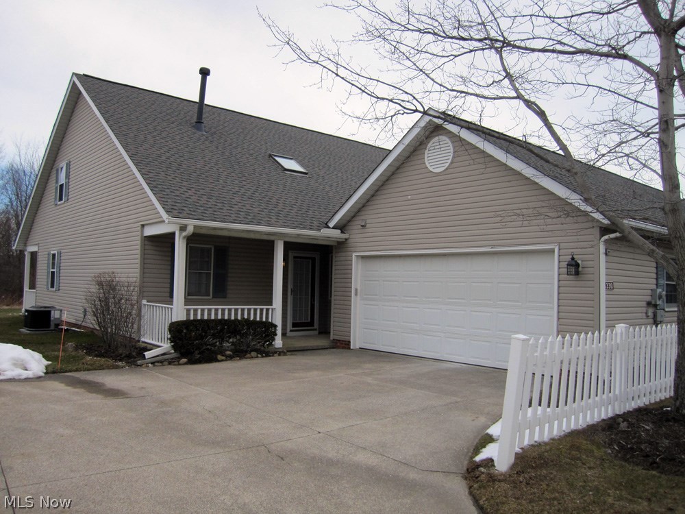 Completely updated Macintosh Farms Condo in prime location with wooded views. This end unit offers 1st floor Master Bedroom, 2 story Foyer and staircase, 2 car attached garage in a community with pool, tennis courts, trails, clubhouse and quick access to highways leading to Cleveland and Akron. This spacious home features updates galore to include Eat-in Kitchen with new Stainless Appliances, striking black granite counters and working center island. Open Dining and Living Rooms have beautiful new wood laminate flooring and there's a painted brick gas log fireplace in the living room and Sliders to a covered patio. All 3 spacious Bedrooms, stairway and upper hall received quality plush carpeting in a fashionable neutral color. The entire interior has been professionally repainted in gorgeous neutral color, most lighting fixtures have also been replaced. New Furnace & Central Air in 2017. There really is nothing to here other than "move in" and enjoy all that this Southern Cuyahoga County Community has to offer. This property includes a 1 year home warranty with Americas Preferred with only a $75 deductible. pull down ladder to attic storage in 2 car garage